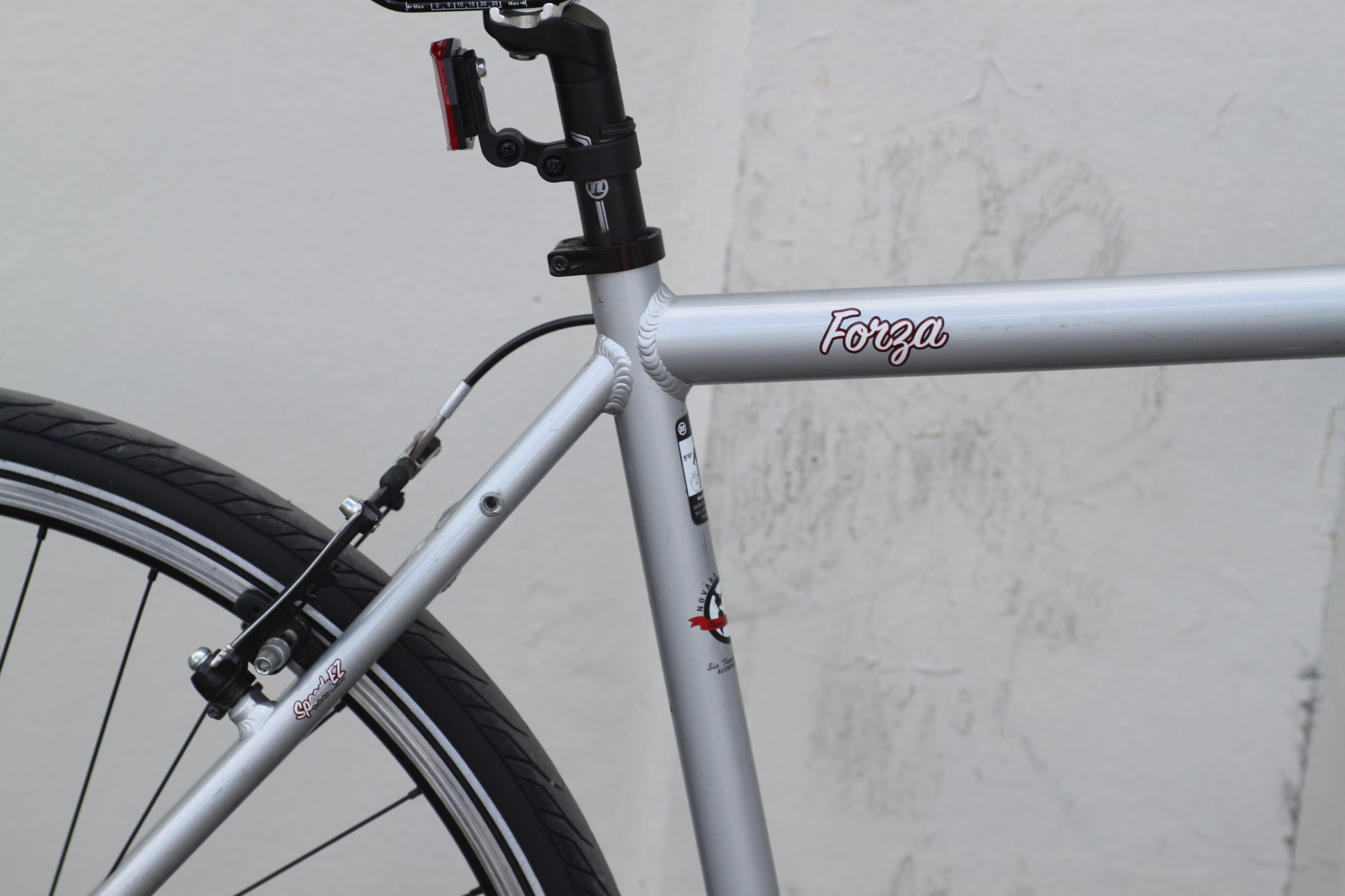 Novara Forza Commuter Hybrid Bike with Suspension Fork L silver