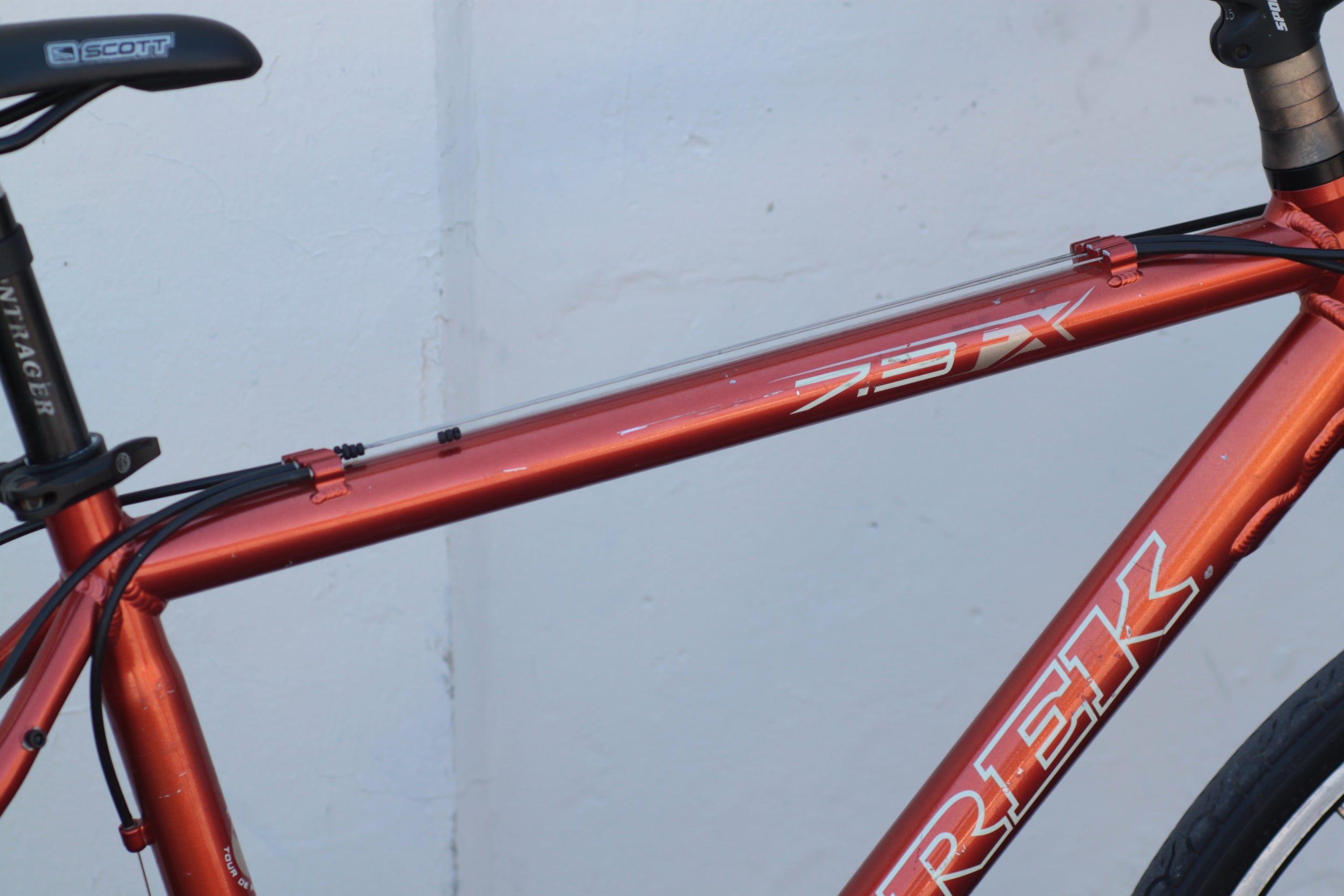 Trek 7.3 FX Commuter Hybrid with 700x35c Tires orange CIUP Used Bikes for Sale Silicon Valley Bicycle Exchange Bay Area