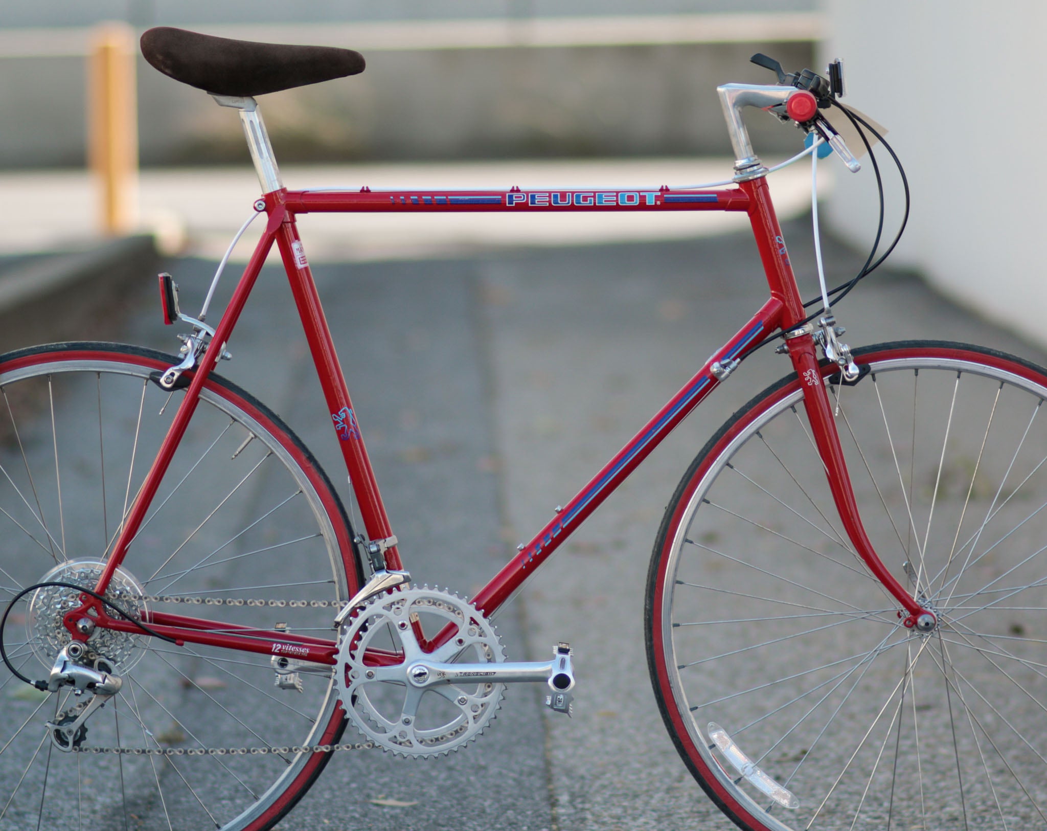 Red top peugeot bike